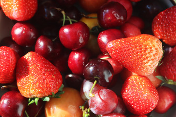 Fresh strawberries, delicious cherries and sweet red grapes. Eat more fruits and be more healthy!