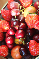 Fresh strawberries, delicious cherries and sweet red grapes. Eat more fruits and be more healthy!