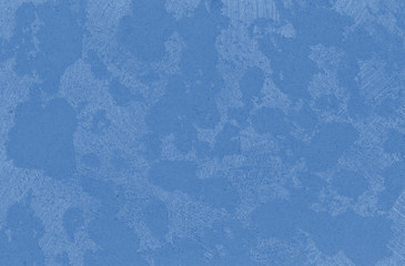 blue paint texture with inclusions toned in trendy Classic Blue color of the Year 2020