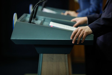 Details with the hand of a politician during a press conference