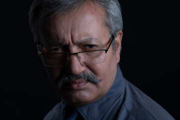 Obraz premium Portrait of an angry senior man.