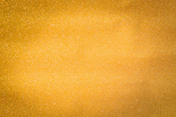 Fototapeta na wymiar Gold background light. Golden glitter texture.