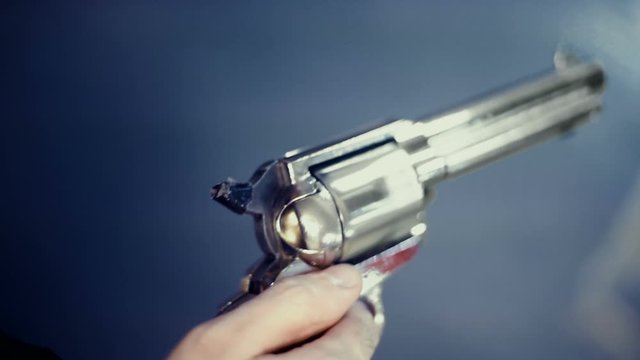 spinning a revolver up close cylinder