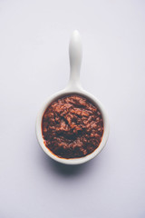 Homemade Tandoori Paste or Marinade mixture, in a bowl. used for grilled chicken or Paneer or vegetable. selective focus