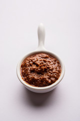 Homemade Tandoori Paste or Marinade mixture, in a bowl. used for grilled chicken or Paneer or vegetable. selective focus