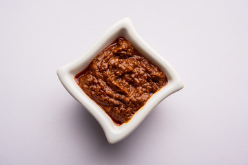 Homemade Tandoori Paste or Marinade mixture, in a bowl. used for grilled chicken or Paneer or vegetable. selective focus