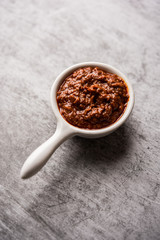 Homemade Tandoori Paste or Marinade mixture, in a bowl. used for grilled chicken or Paneer or vegetable. selective focus