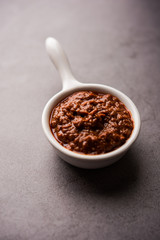 Homemade Tandoori Paste or Marinade mixture, in a bowl. used for grilled chicken or Paneer or vegetable. selective focus