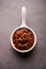 Homemade Tandoori Paste or Marinade mixture, in a bowl. used for grilled chicken or Paneer or vegetable. selective focus