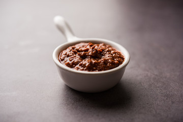 Homemade Tandoori Paste or Marinade mixture, in a bowl. used for grilled chicken or Paneer or vegetable. selective focus