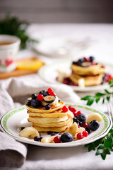 Gluten free pancakes with mixed berry.style vintage