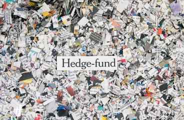 Newspaper confetti from above with the words Hedge fund