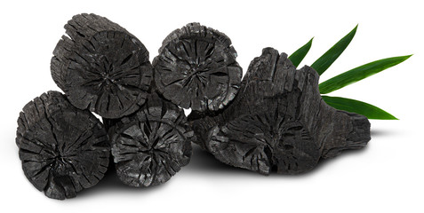 Natural wood charcoal isolated on white background