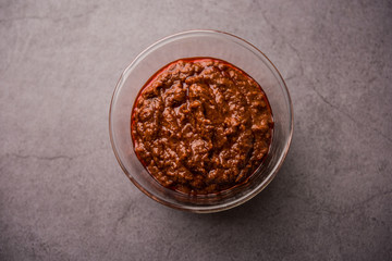 Homemade Tandoori Paste or Marinade mixture, in a bowl. used for grilled chicken or Paneer or vegetable. selective focus