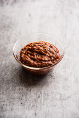 Homemade Tandoori Paste or Marinade mixture, in a bowl. used for grilled chicken or Paneer or vegetable. selective focus