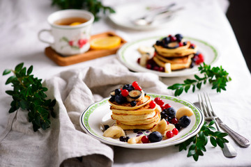 Gluten free pancakes with mixed berry.style vintage