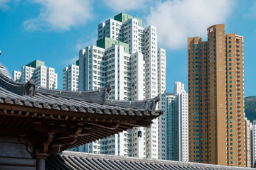 old roof detail, traditional Chinese architecture and skyscraper buildings in background, HongKong