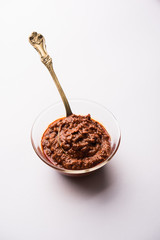 Homemade Tandoori Paste or Marinade mixture, in a bowl. used for grilled chicken or Paneer or vegetable. selective focus