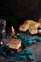 Two color chocolate cake on the dark  background.