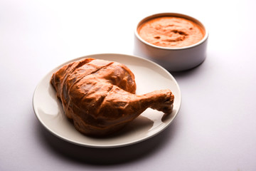 Homemade Tandoori Paste or Marinade mixture, in a bowl. used for grilled chicken or Paneer or vegetable. selective focus