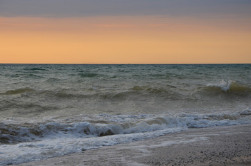 Fototapeta na wymiar Seascape in the colors of sunset