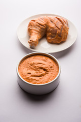 Homemade Tandoori Paste or Marinade mixture, in a bowl. used for grilled chicken or Paneer or vegetable. selective focus