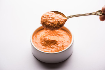 Homemade Tandoori Paste or Marinade mixture, in a bowl. used for grilled chicken or Paneer or vegetable. selective focus