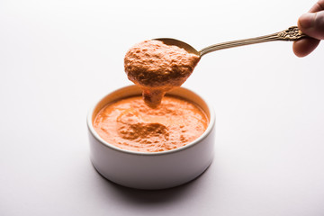 Homemade Tandoori Paste or Marinade mixture, in a bowl. used for grilled chicken or Paneer or vegetable. selective focus