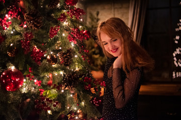 Woman Near Christmas Tree