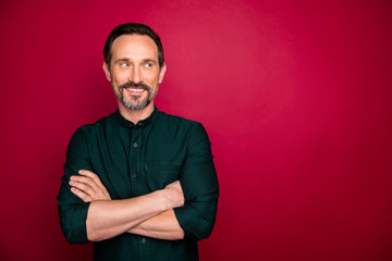 Close-up portrait of his he nice attractive cheerful cheery bearded smart clever successful man manager folded arms isolated on bright vivid shine vibrant maroon burgundy marsala red color background