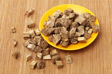 Root of kudzu vine,puerarin in hay background