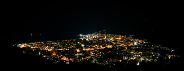 panoramic view of Budva city lights at night