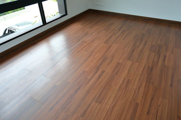 brown wood laminate floor in residential house