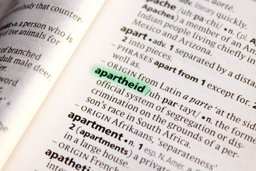 Apartheid word or phrase in a dictionary. - obrazy, fototapety, plakaty