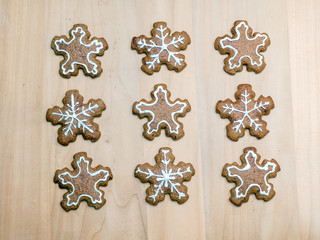 Christmas gingerbread snowflake-shaped cookies