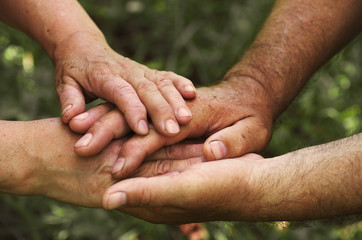 Old people holding hands. Closeup.