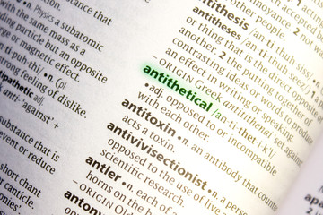 Antithetical word or phrase in a dictionary.