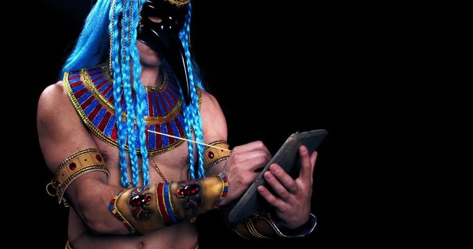 God of wisdom and writing of ancient Egypt, Thoth is writing on a stone, 4k