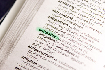 Obraz premium Antipathy word or phrase in a dictionary.