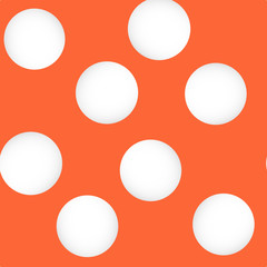 white polka dots on orange
