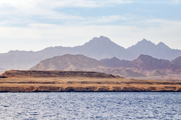 Mountain landscape with blue water in the national park Ras Mohammed, Egypt.