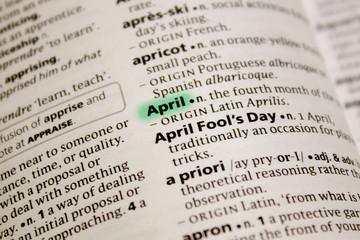Fototapeta premium April word or phrase in a dictionary.
