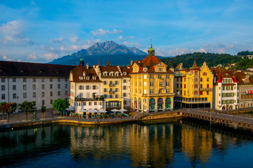 Fototapeta na wymiar City of Lucerne with River and Building and Mountain Pilatus in a Sunny Day in Switzerland.