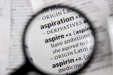 The word or phrase aspire in a dictionary.