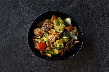 Duck Breast Fillets Steak with orange Halves and Vegetables.