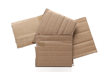 Cardboard pieces pile for recycling isolated on white background