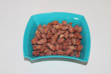 Peanuts in bowl, peanuts in a bowl, white background.