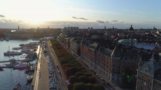 Stockholm Strandv&auml;gen in &Ouml;stermalm district at sunset aerial view. Drone shot flying over street avenue. Cityscape skyline, Capital city of Sweden