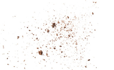 Chocolate shavings and chunks pile isolated on white background, top view