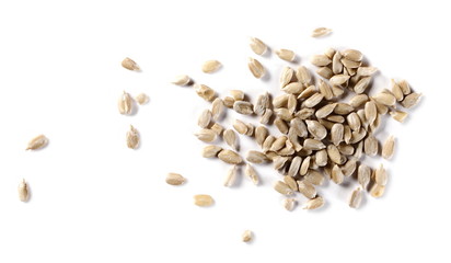 Peeled sunflower seeds isolated on white background, top view